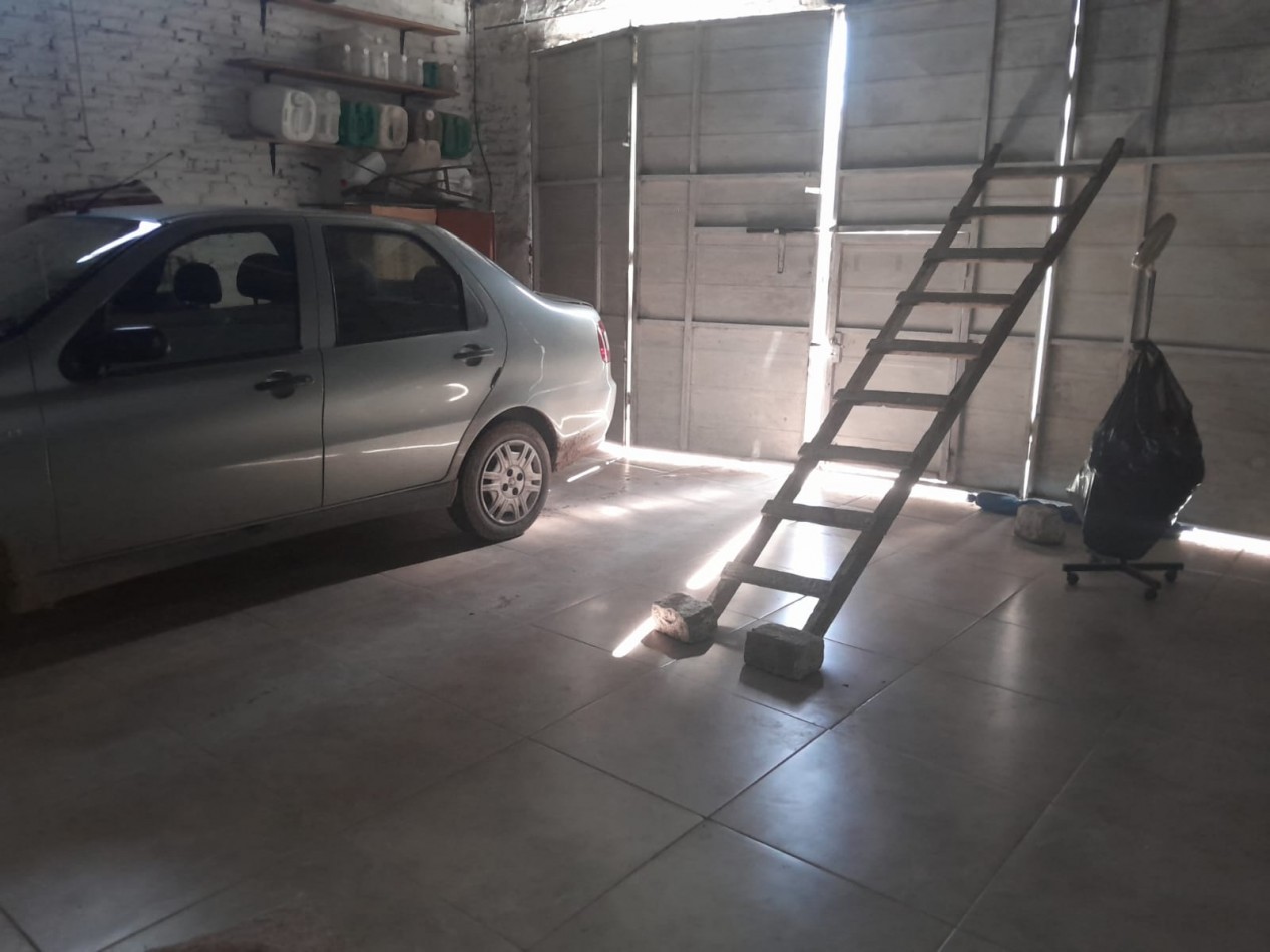 CASA EN OCHAVA MAS DEPARTAMENTO FRENTE HOSPITAL ITURRASPE