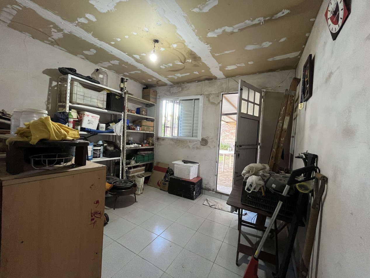 CASA CON GRAN PATIO VERDE ! IMPERDIBLE