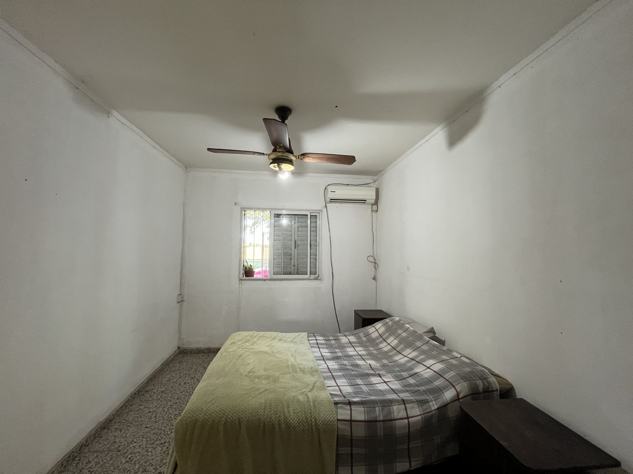 CASA CON GRAN PATIO VERDE ! IMPERDIBLE