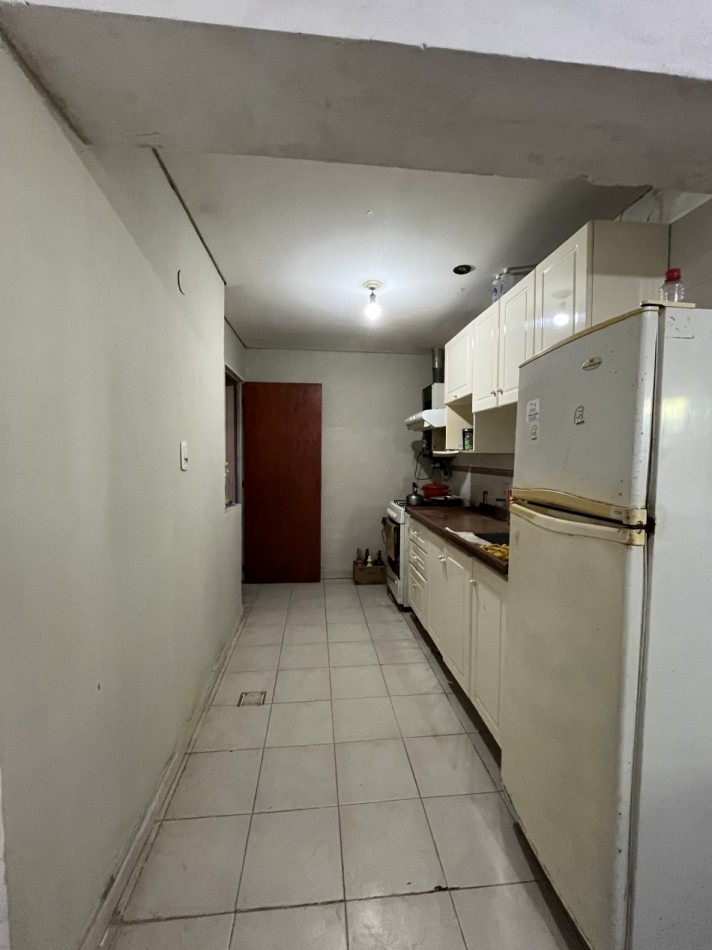 CASA CON GRAN PATIO VERDE ! IMPERDIBLE